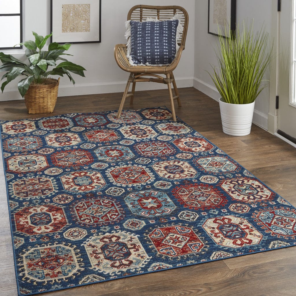 4' X 6' Blue Red And Tan Abstract Power Loom Distressed Stain Resistant Area Rug