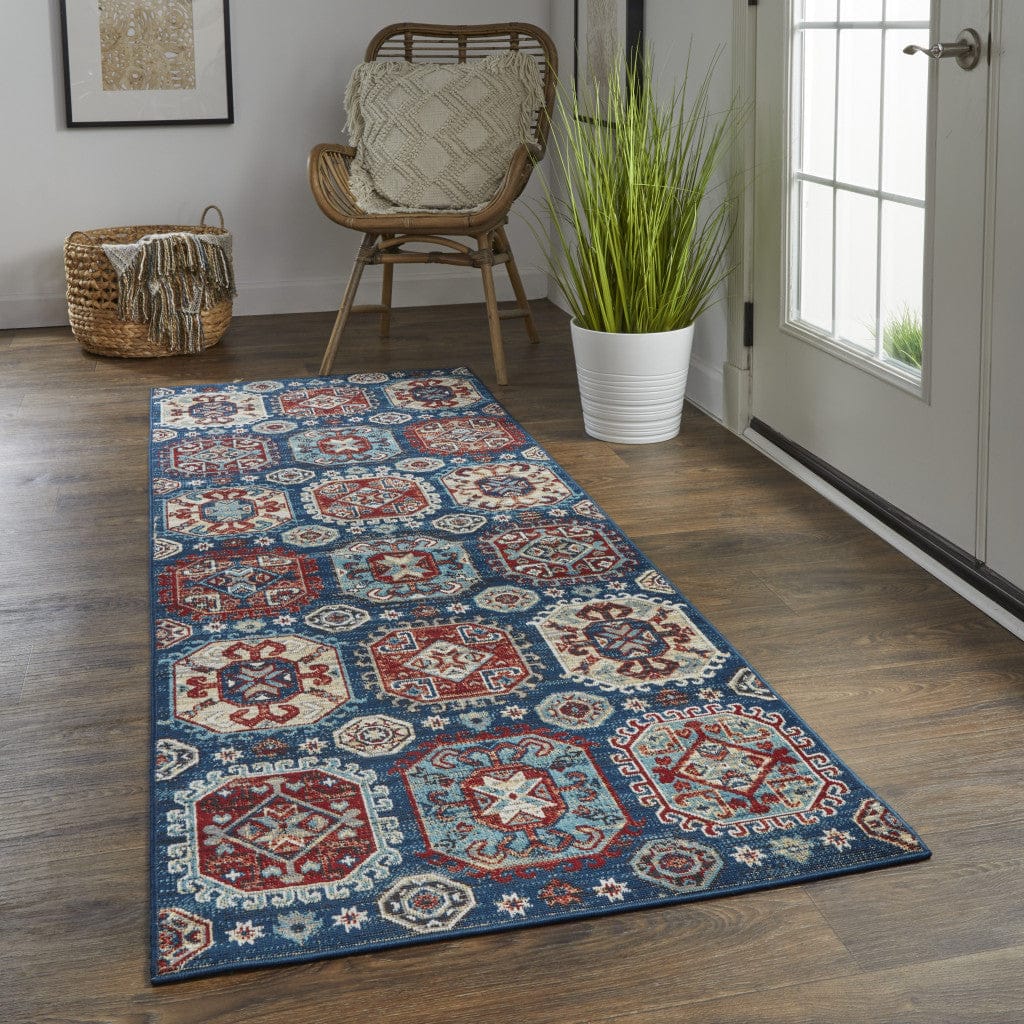 4' X 6' Blue Red And Tan Abstract Power Loom Distressed Stain Resistant Area Rug