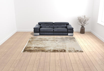 4' X 6' Tan Ivory And Gray Abstract Area Rug