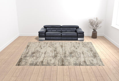 4' X 6' Ivory And Brown Abstract Area Rug