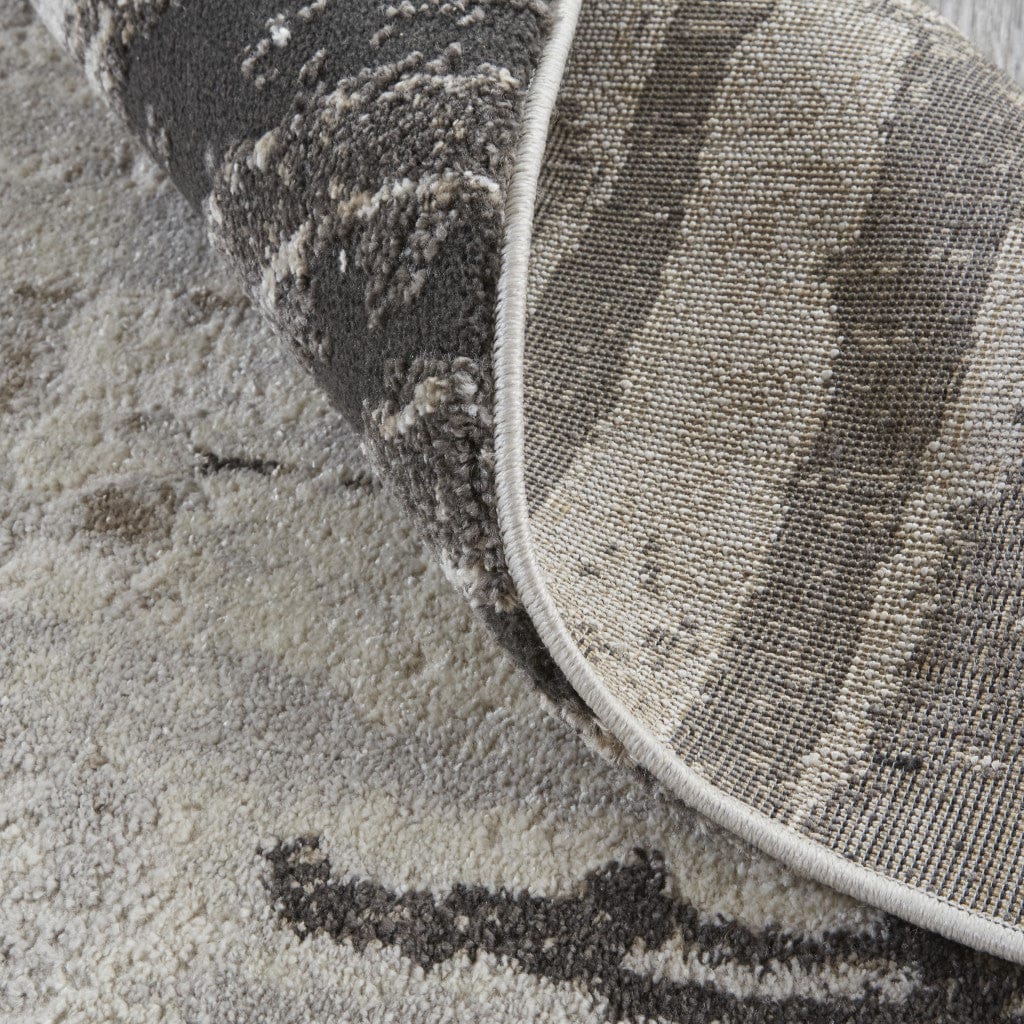 4' X 6' Ivory Brown And Gray Abstract Power Loom Stain Resistant Area Rug