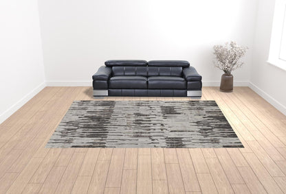 4' X 6' Ivory Brown And Gray Abstract Power Loom Stain Resistant Area Rug