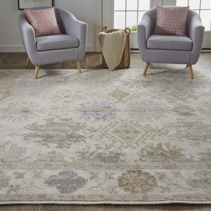 5' X 8' Ivory Tan And Blue Floral Hand Knotted Stain Resistant Area Rug