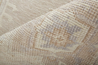 4' X 6' Tan And Brown Floral Hand Knotted Stain Resistant Area Rug