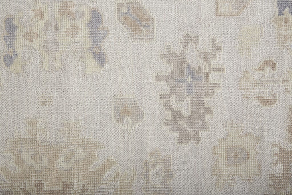 4' X 6' Tan Ivory And Orange Floral Hand Knotted Stain Resistant Area Rug