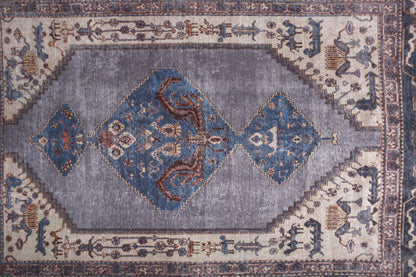 4' X 6' Blue Brown And Ivory Floral Area Rug