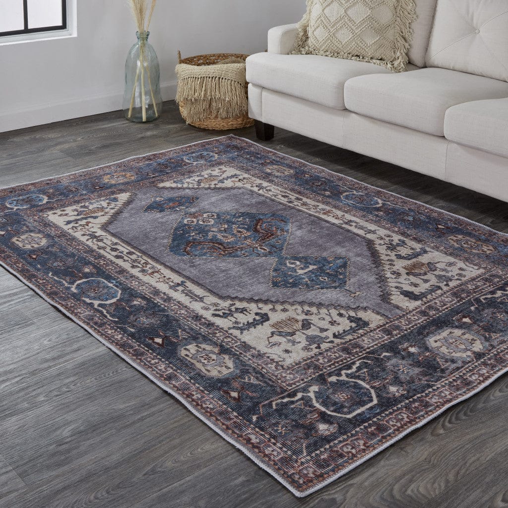 4' X 6' Blue Brown And Ivory Floral Area Rug