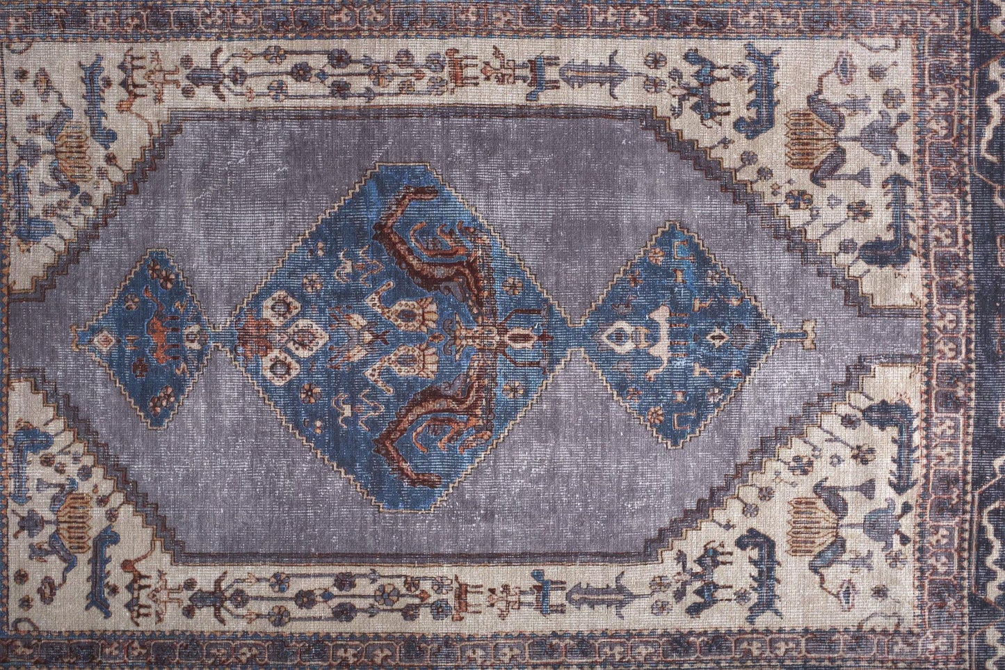 4' X 6' Blue Brown And Ivory Floral Area Rug