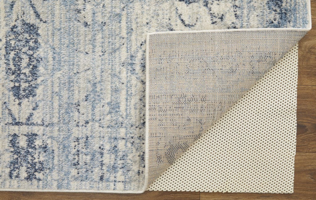 4' X 6' Blue And Ivory Power Loom Distressed Area Rug