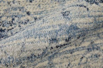 4' X 6' Blue And Ivory Power Loom Distressed Area Rug