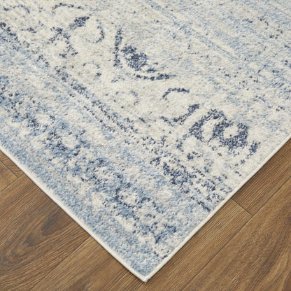 4' X 6' Blue And Ivory Power Loom Distressed Area Rug