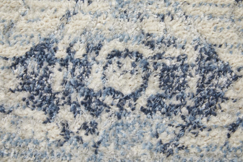 4' X 6' Blue And Ivory Power Loom Distressed Area Rug