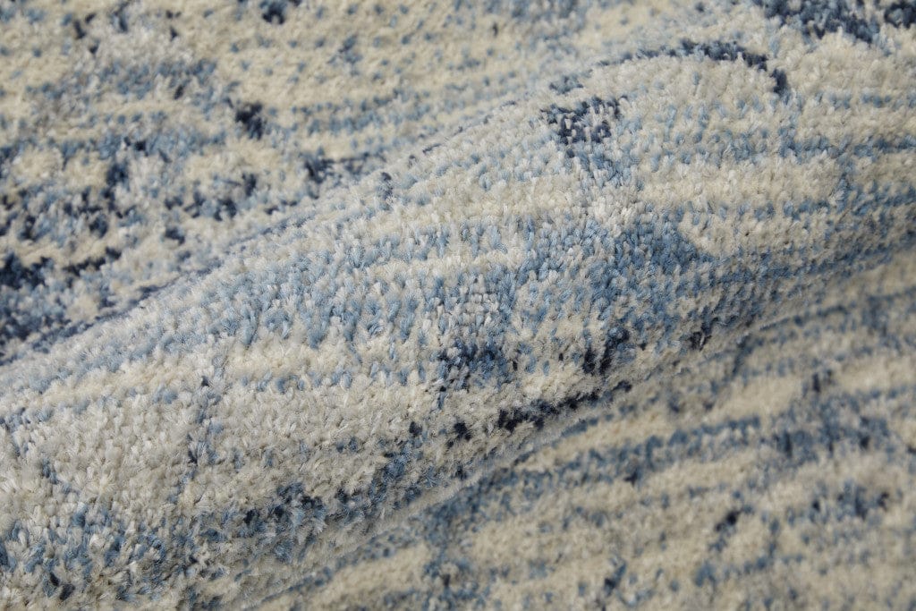 4' X 6' Blue And Ivory Power Loom Distressed Area Rug