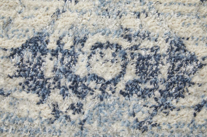 4' X 6' Blue And Ivory Power Loom Distressed Area Rug