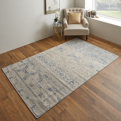 4' X 6' Blue And Ivory Power Loom Distressed Area Rug
