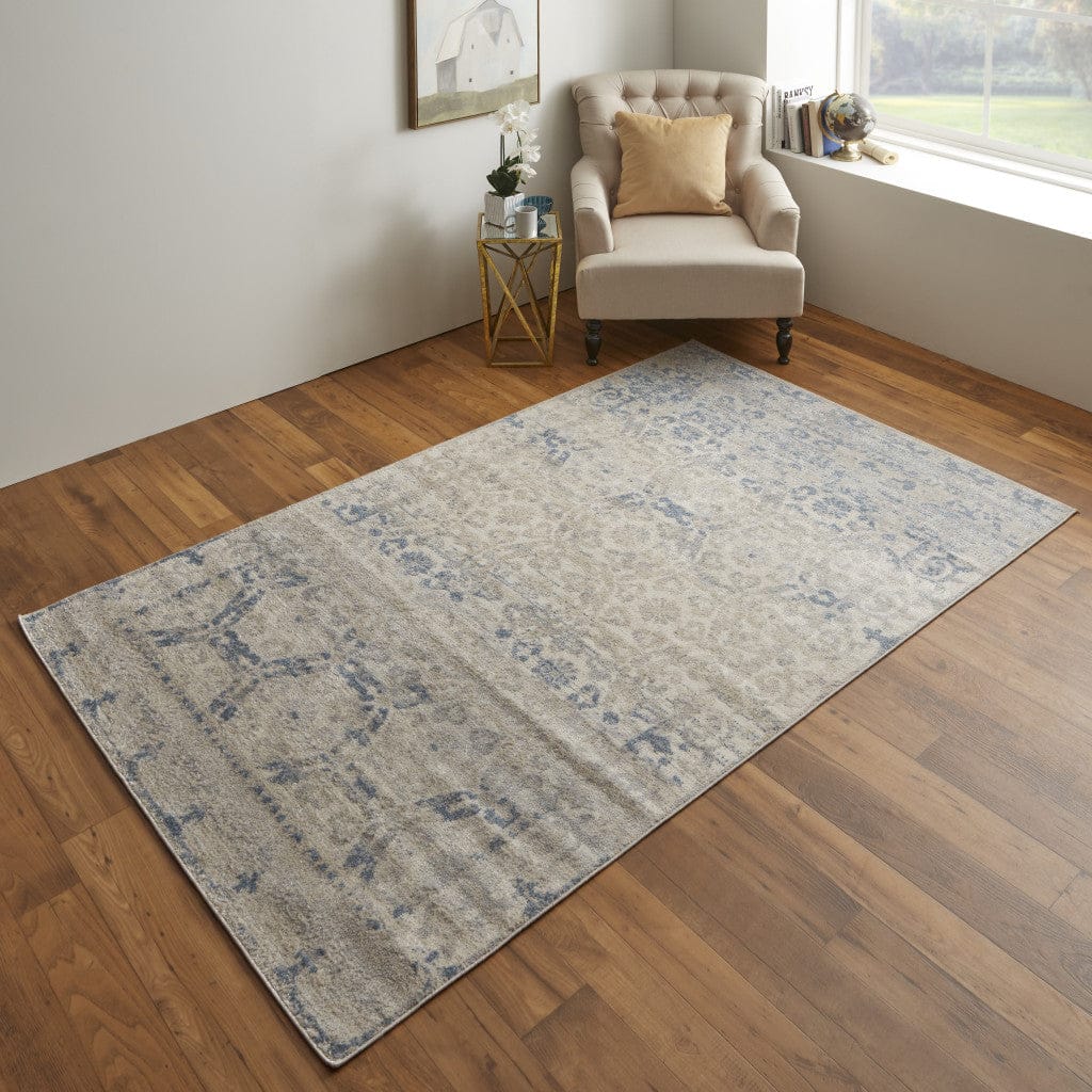 4' X 6' Blue And Ivory Power Loom Distressed Area Rug