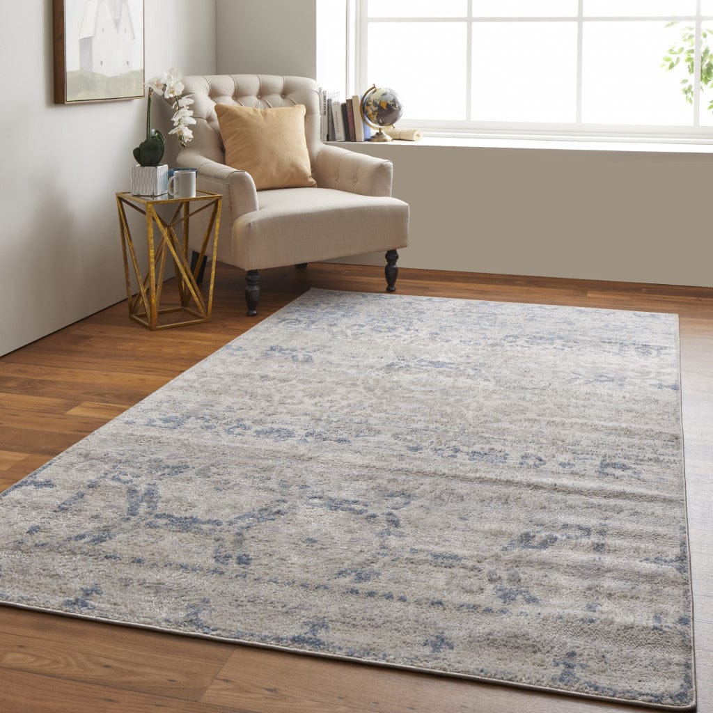 4' X 6' Blue And Ivory Power Loom Distressed Area Rug