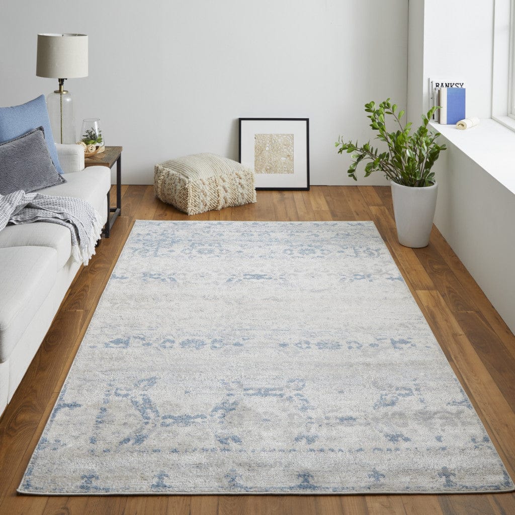 4' X 6' Blue And Ivory Power Loom Distressed Area Rug