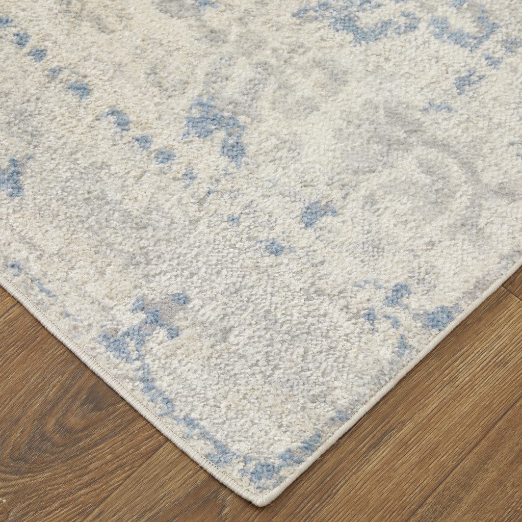 4' X 6' Blue And Ivory Power Loom Distressed Area Rug