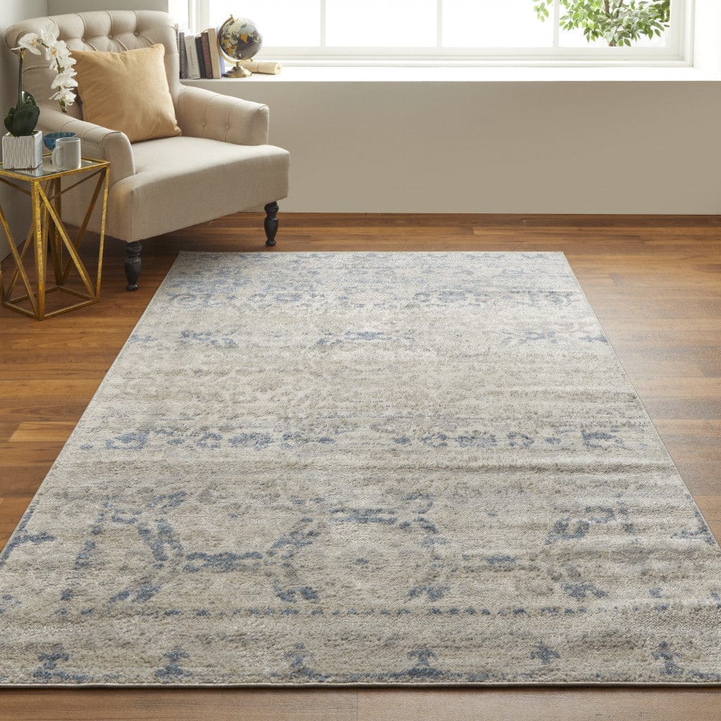 4' X 6' Blue And Ivory Power Loom Distressed Area Rug
