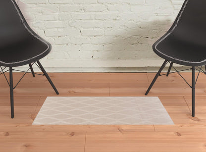 2' X 3' Ivory And Tan Geometric Stain Resistant Area Rug