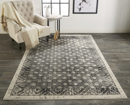 2' X 3' Ivory Black And Taupe Abstract Stain Resistant Area Rug