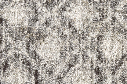 2' X 3' Ivory Black And Taupe Abstract Stain Resistant Area Rug