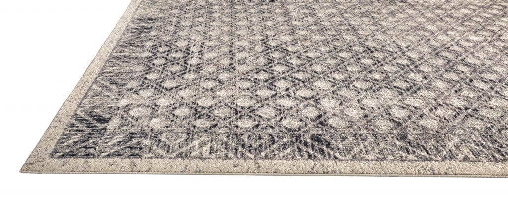 2' X 3' Ivory Black And Taupe Abstract Stain Resistant Area Rug