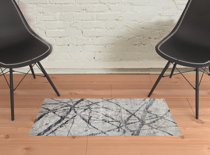 2' X 3' Taupe Gray And Ivory Abstract Stain Resistant Area Rug