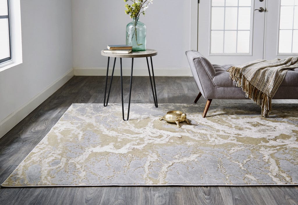 2' X 3' Ivory Silver And Gold Abstract Stain Resistant Area Rug