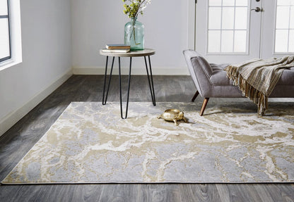 2' X 3' Ivory Silver And Gold Abstract Stain Resistant Area Rug