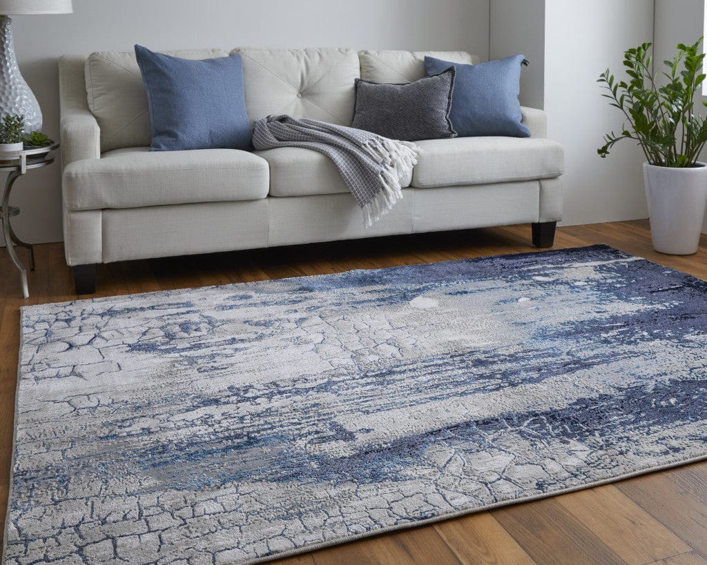 2' X 3' Ivory Blue And Black Abstract Power Loom Distressed Area Rug