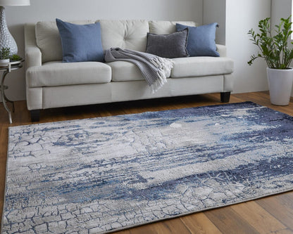 2' X 3' Ivory Blue And Black Abstract Power Loom Distressed Area Rug