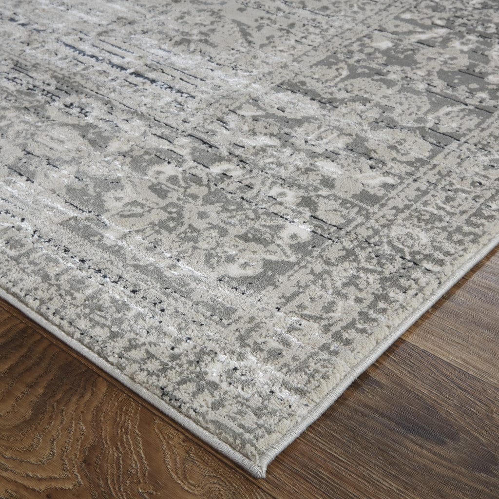 2' X 3' Gray Silver And Taupe Floral Power Loom Distressed Area Rug