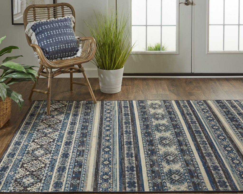 2' X 3' Blue Tan And Black Geometric Power Loom Distressed Stain Resistant Area Rug