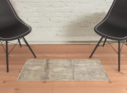 2' X 3' Tan Ivory And Brown Abstract Area Rug