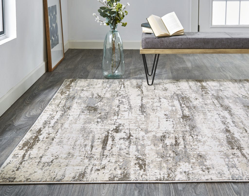 2' X 3' Ivory And Brown Abstract Area Rug