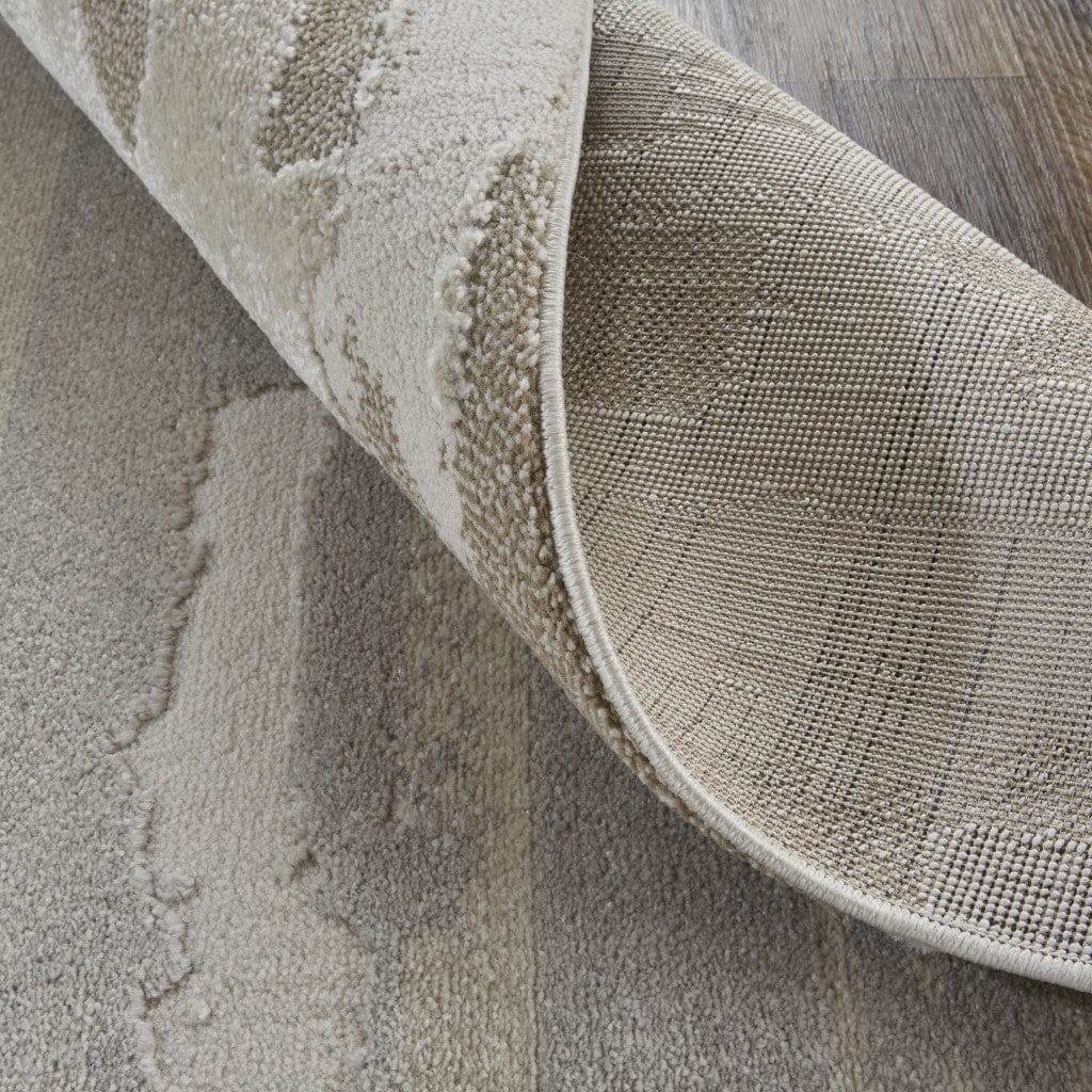 2' X 3' Ivory Tan And Brown Abstract Power Loom Distressed Stain Resistant Area Rug