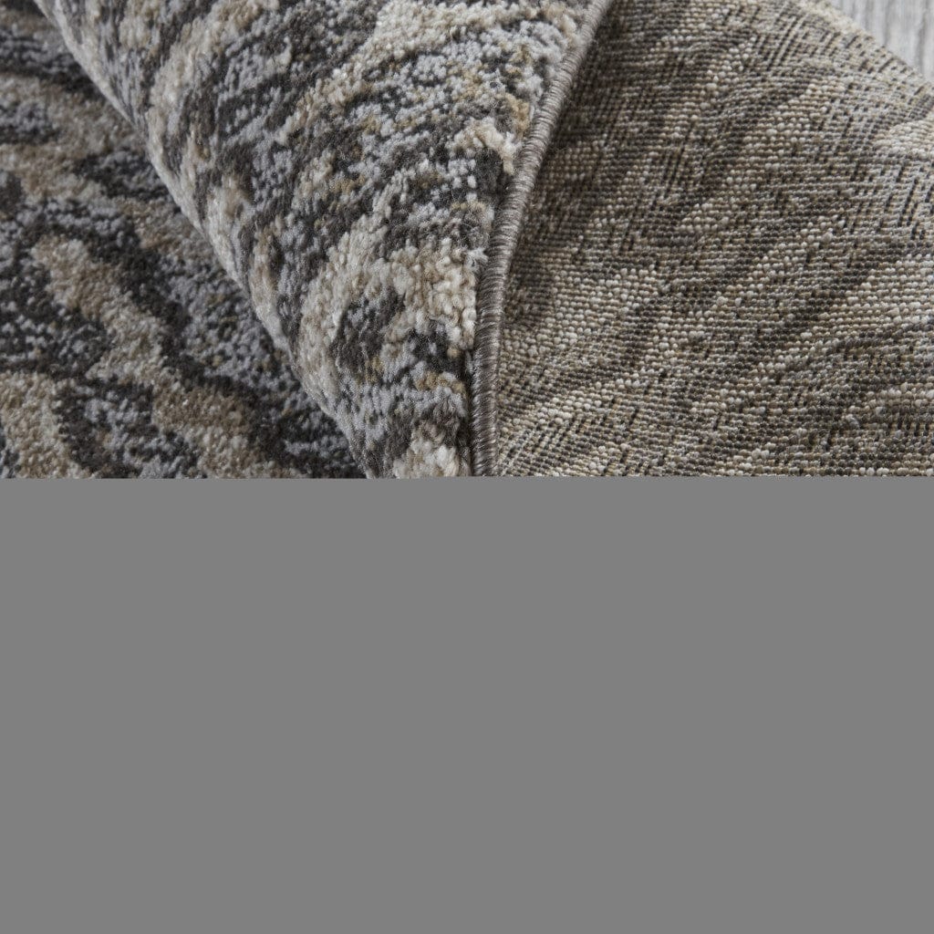 2' X 3' Gray Taupe And Ivory Abstract Power Loom Stain Resistant Area Rug